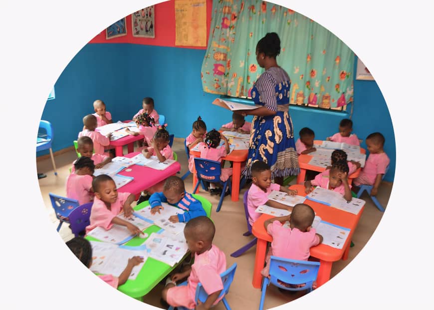 Nursery classroom with young children learning